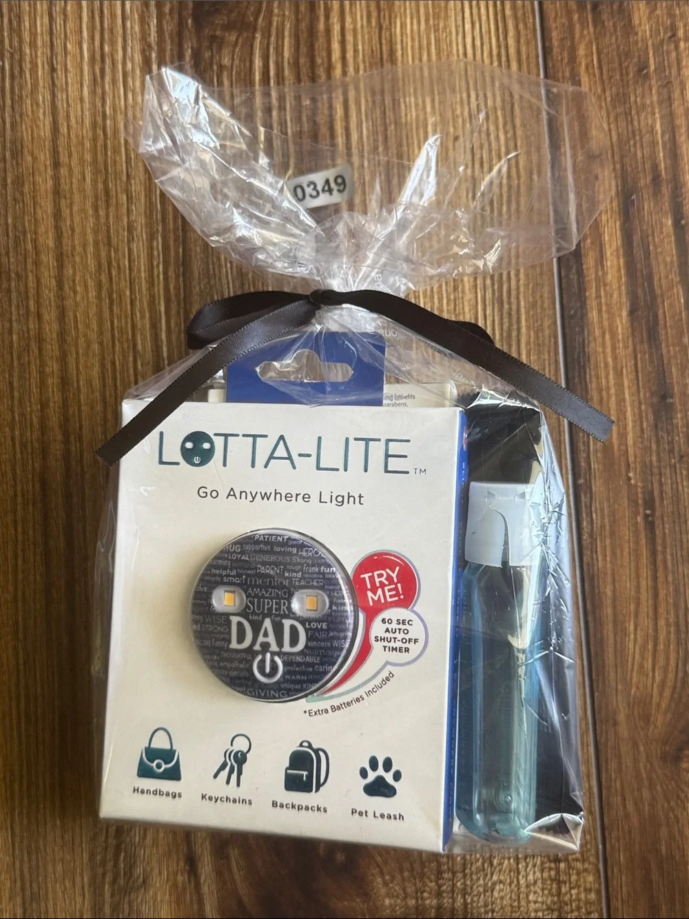 The Dad Lotta-Lite navy blue graphic-print LED clip-on light.